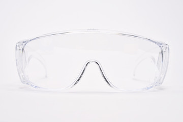 Construction and safety equipment goggles. Workwear transparent plastic eyewear