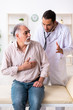 © Elnur - Old man visiting young male doctor cardiologist