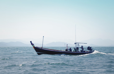 Poster - boat in the sea in the evening sunlight over beautiful sky background, luxury summer adventure, active vacation in Thailand