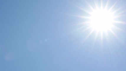sun traveling across clear blue sky, hot sunny day, looking into the summer sky, lens flare, 4k
