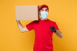 © ViDi Studio - Delivery man employee in red cap blank t-shirt uniform face mask glove hold empty cardboard box isolated on yellow background studio Service quarantine pandemic coronavirus flu virus 2019-ncov concept