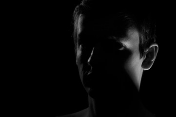  black and white dramatic portrait of a guy