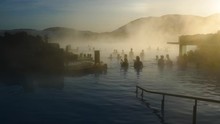 Crowd Of People Enjoying Spa In Geothermal Mineral Hot Spring Blue Lagoon