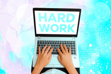 Wall Mural - Text sign showing Hard Work. Business photo showcasing always putting a lot of effort and care into work or endurance