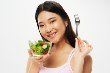 Wall Mural - young woman with salad