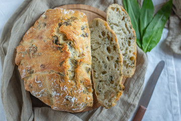 Wall Mural - home made freshly baked no knead bread with wild garlic