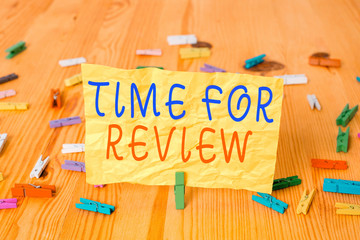 Wall Mural - writing note showing time for review. business concept for review of a system or situation in its fo
