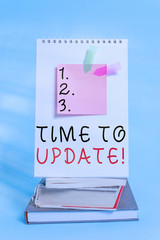 Wall Mural - Conceptual hand writing showing Time To Update. Concept meaning this is right moment to make something more modern new Spiral notebook sticky note banners books pastel background