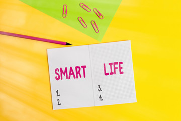 Text sign showing Smart Life. Business photo showcasing approach conceptualized from a frame of prevention and lifestyles Blank paper sheet pencil clips smartphone two notepads colored background