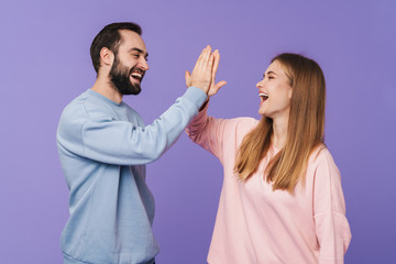 Wall Mural - cheery optimistic loving couple posing isolated