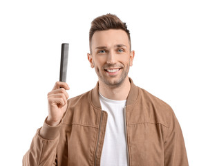 Poster - Handsome young man with comb on white background