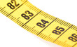 © michaklootwijk - Close-up of a yellow measuring tape isolated on white - 84