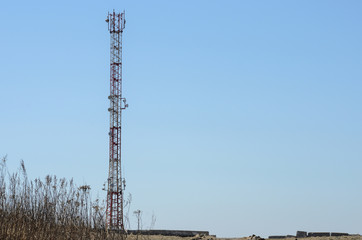 Tower with radio antennas. Telecommunication technology 5g. Mobile communications and the Internet.