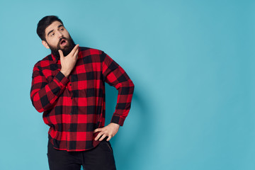 Wall Mural - handsome young man in red shirt