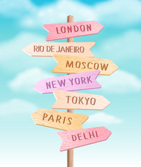 Vector wooden colorful signpost with direction to different cities. Travel sign board arrow illustration on sky background