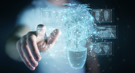 Fototapete - Man holding and touching holographic projection of a plant with digital analysis 3D rendering