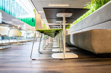 Wall Mural - Empty food court without people with tables and chairs in the mall. 