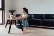 © JodieWang - young asian beauty woman use laptop at home