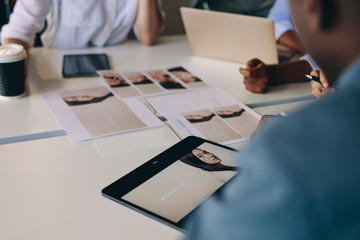 Wall Mural - Creative business people selecting material for a project