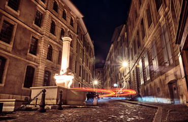 City landscape. Historic street in Geneva at night.