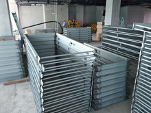 Mild Steel Door Frame Stacked Horizontally At The Construction Site. Workers Will Transport The Frame To The Designated Installation Location. 