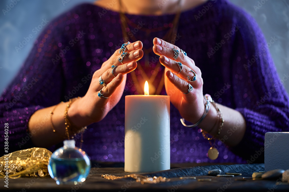Fortune teller woman using burning candle flame for spell, witchcraft, divination and fortune telling. Spiritual esoteric occult magic ritual illustration - obrazy, fototapety, plakaty 