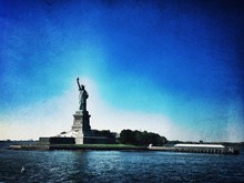 Statue Of Liberty Against Clear Blue Sky At New York City