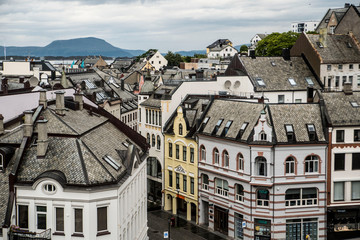 colorful buildings and street in alesund norway