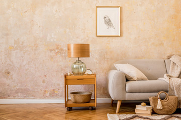 Wall Mural - stylish concept of living room interior with coffee table, table lamp, design grey sofa, mock up pic