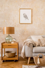 Wall Mural - stylish concept of living room interior with coffee table, table lamp, design grey sofa, mock up pic