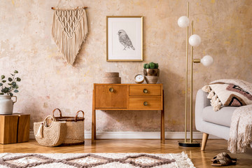Wall Mural - modern retro composition of living room with wooden vintage commode, grey sofa, gold lamp, macrame, 