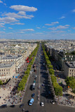 Fototapeta Paryż - PARIS, FRANCE, EUROPE -Aerial view of Paris, France as seen from the Arch of Triumph on a sunny day with white puffy clouds, shot August 4, 2015