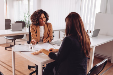 consulting with a financial manager at the bank