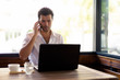 © Ranta Images - Portrait of handsome Turkish man relaxing at the coffee shop