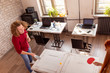 © Impact Photography - Business people playing table tennis at the office