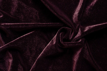 Velvet background. Velvet is red. dark red color. Beautiful fabric Abstract