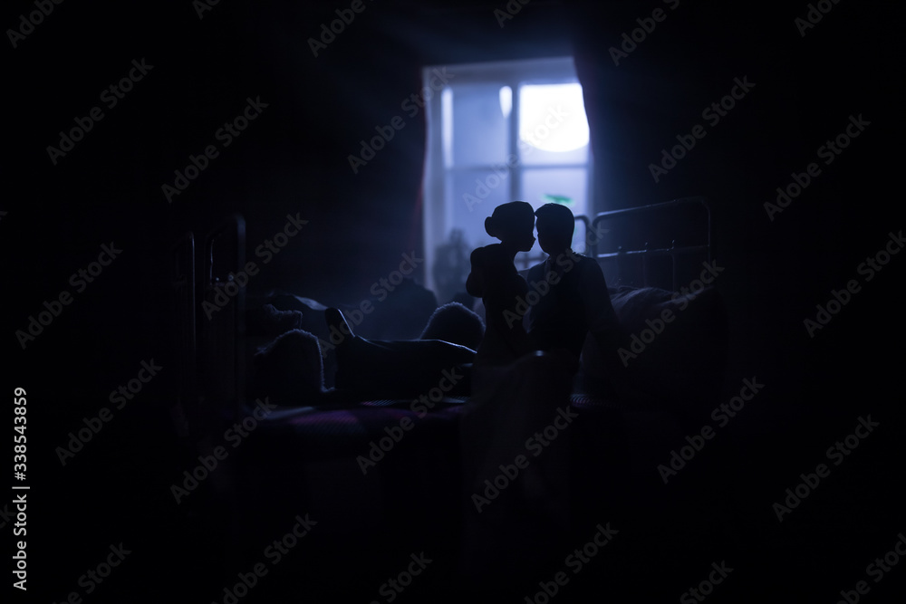Beautiful passionate young couple lying on bed and having sex. Sensual