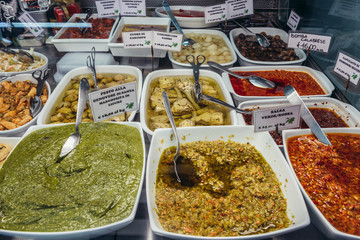 Sticker - Food stall with pasta for sale in covered food market called Mercato Delle Erbe in Bologna city, Italy