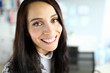 © H_Ko - Close-up of cheerful smiling female posing on camera. Macro shot of brunette young woman with beautiful appearance. Copy space in right side. Modeling and beauty concept