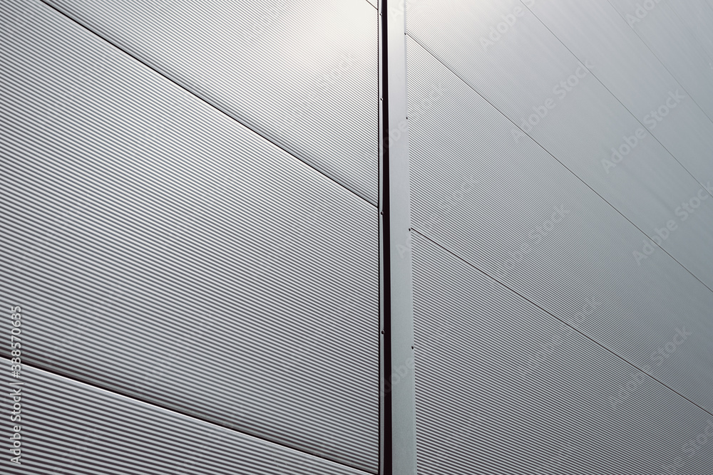Metal Cladding Gray Modern gray warehouse with sheet metal cladding Stock Photo | Adobe Stock