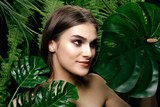 Fototapeta  - beautiful woman green leaves nature charm