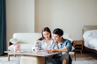 © JodieWang - Asian couple at home Financial management