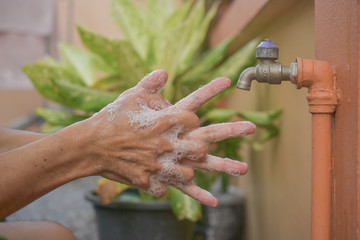  Close up people use Liquid soap cleaning hand safe corona virus 2019