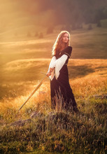 Beautiful Woman With Sword In A Historical Clothing, Painting Effect.