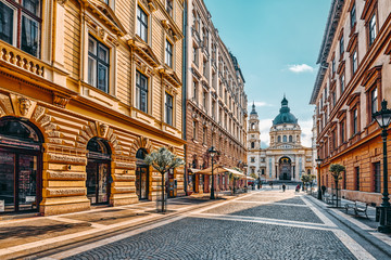 Wall Mural - BUDAPEST,HUNGARU-MAY 04, 2016: St.Stephen Basilica in Budapest at daytime. View through street early morning. Hungary.