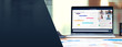 © weedezign - laptop show video conference with coworker team discussion about business chart market on desk at blur home background .banner for display of design.live streaming meeting.stay at home.home office