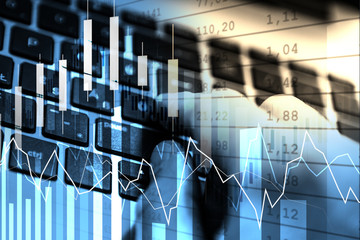 FINANCIAL DIAGRAM. UPTREND LINE. STATISTIC GRAPH WITH BUSINESS MAN AND KEYBOARD BACKGROUND ON BLUE