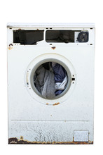 Old Dirty Broken Washing Machine With Clothes Isolated On White Background