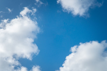 Background nature clear clean blue sky soft clouds beautiful dramatic cloudscape summer sun ray light presents beautiful day life after storm. use as overlay effect or frame with center copy space  