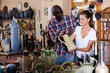 © JackF - Couple choosing ceramics in pottery store
